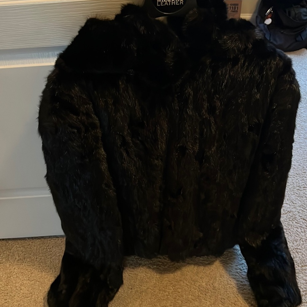 A black Mink Bomber Jacket